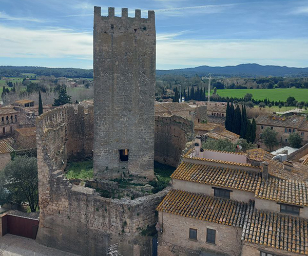 Homage Tower of Peratallada, ancient fortress structure with medieval stone walls