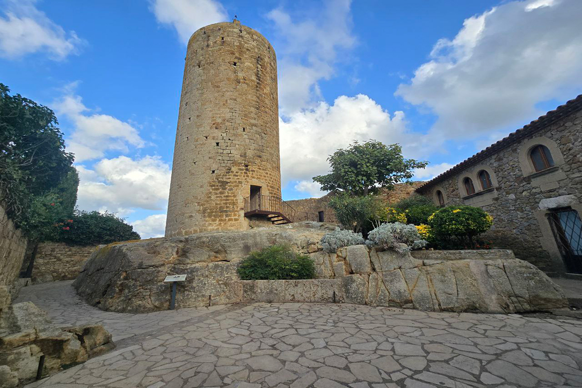 Tower of Hours in Pals with a blue sky in the background